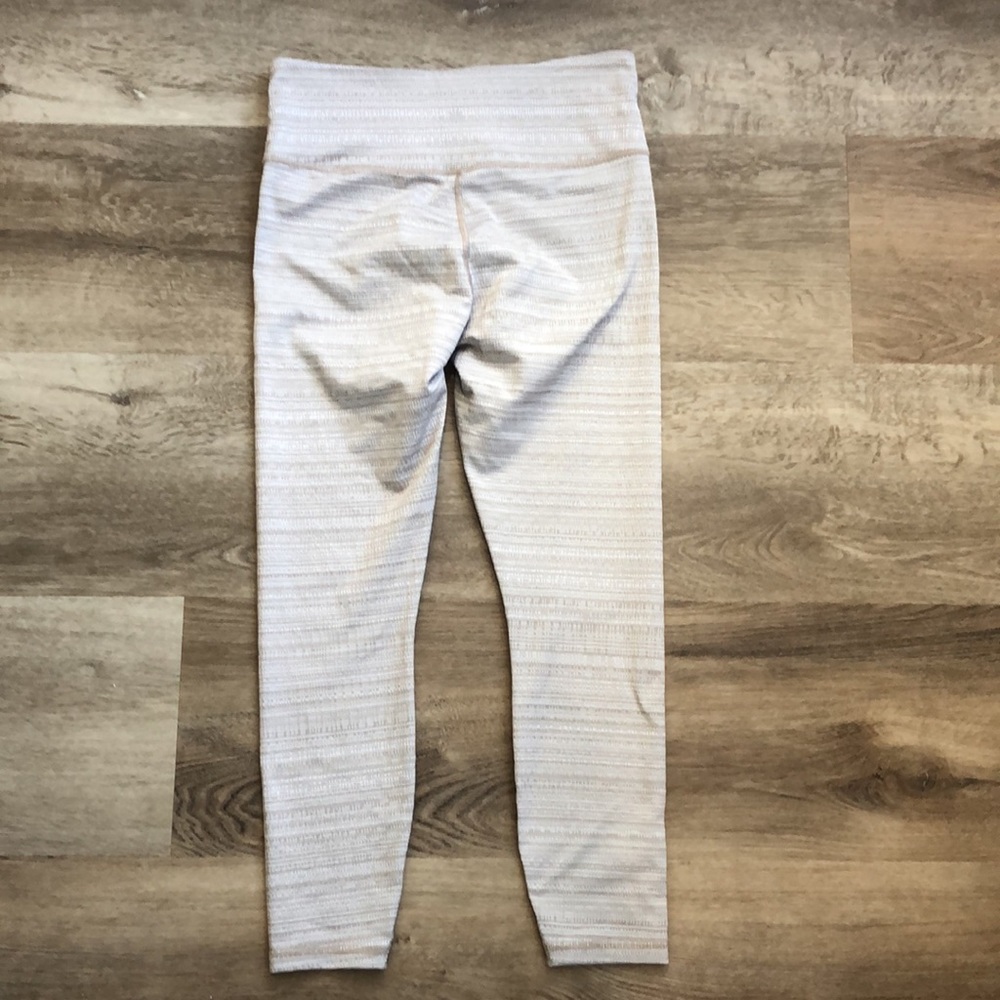 Athleta Leggings In a tan and white textured pattern. - Picture 11 of 13